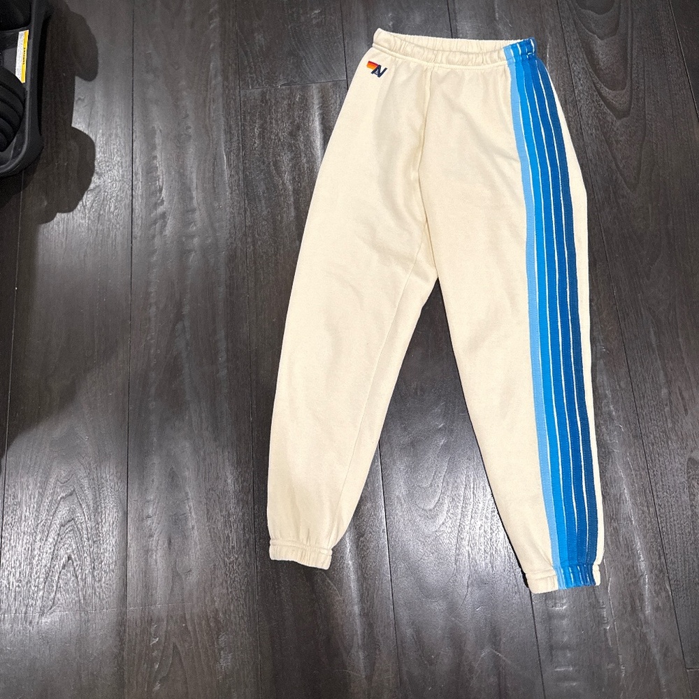 Aviator Nation Cream Track Joggers with Blue Side Stripes
